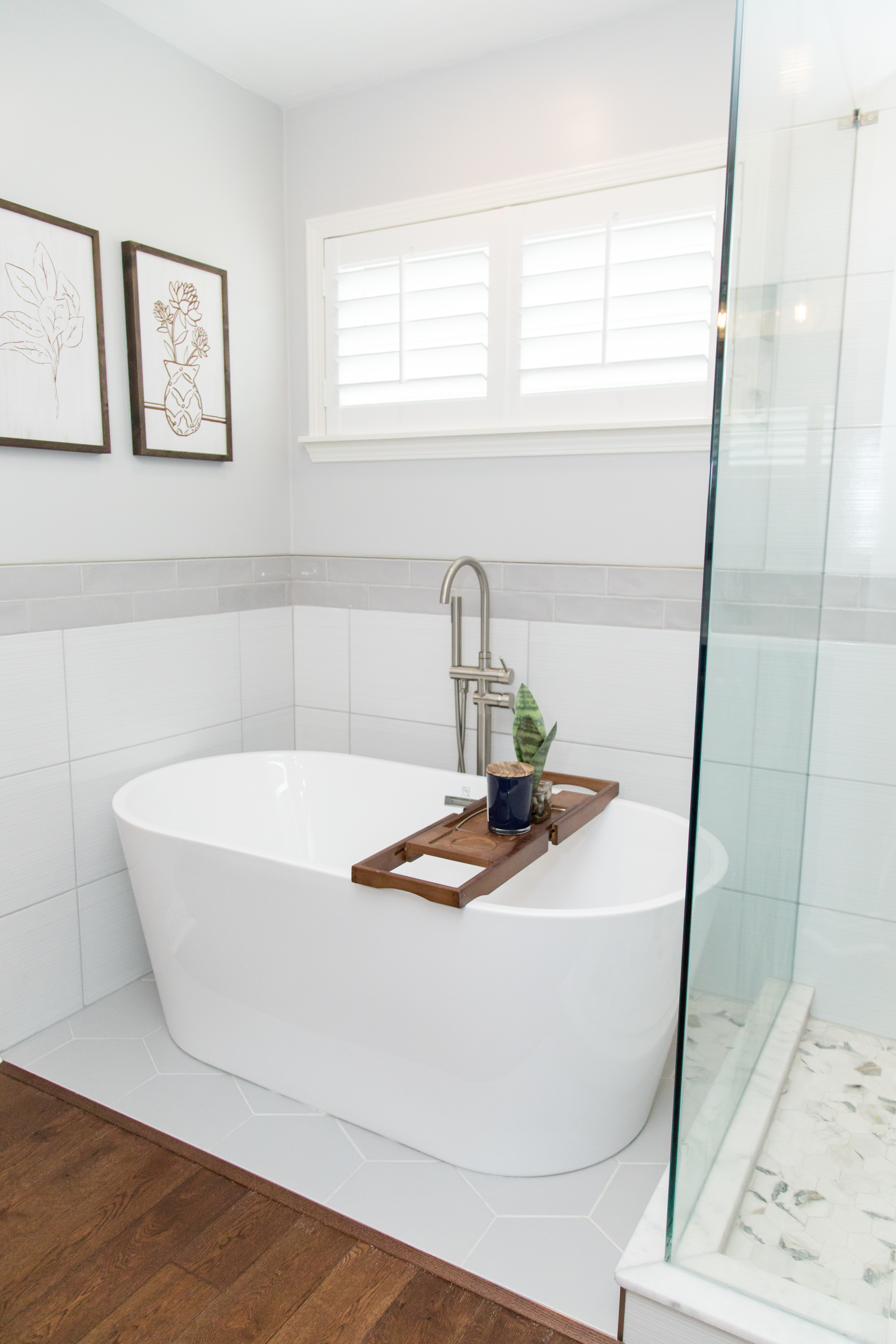 White master bath, freestanding tub & marble hex, view 2 of 7