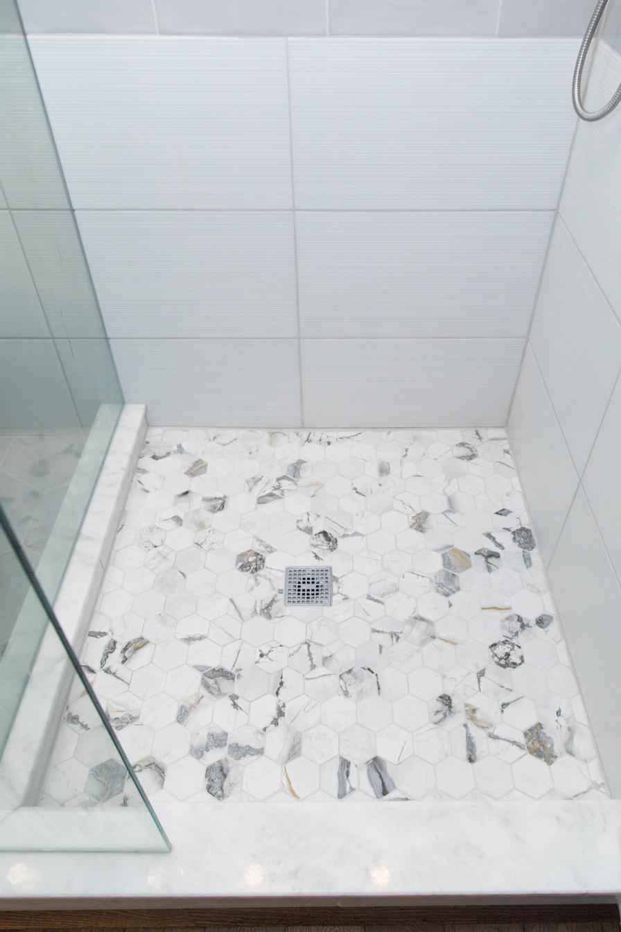 White master bath, freestanding tub & marble hex, view 4 of 7