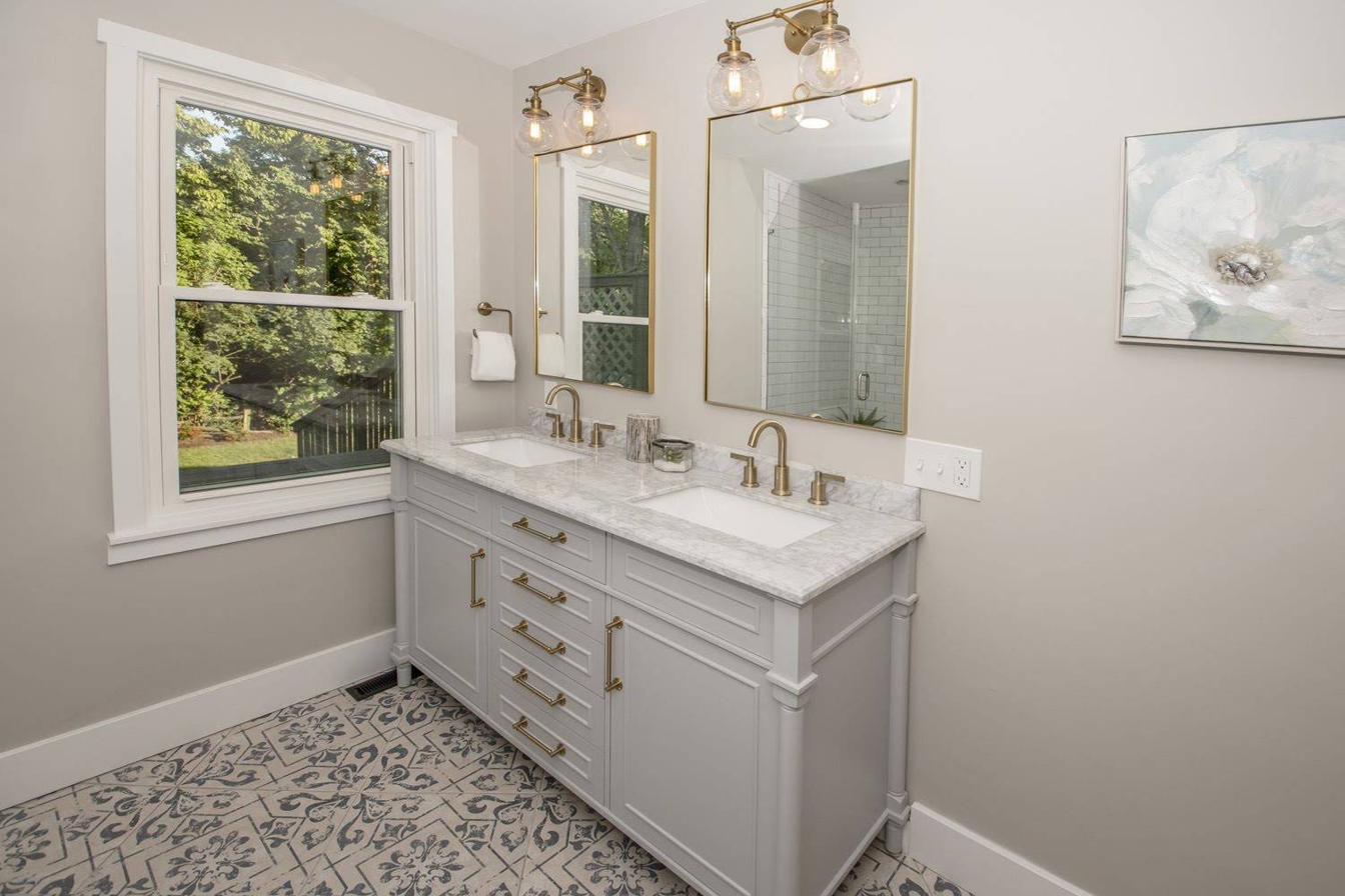 Gray vanity, patterned floor