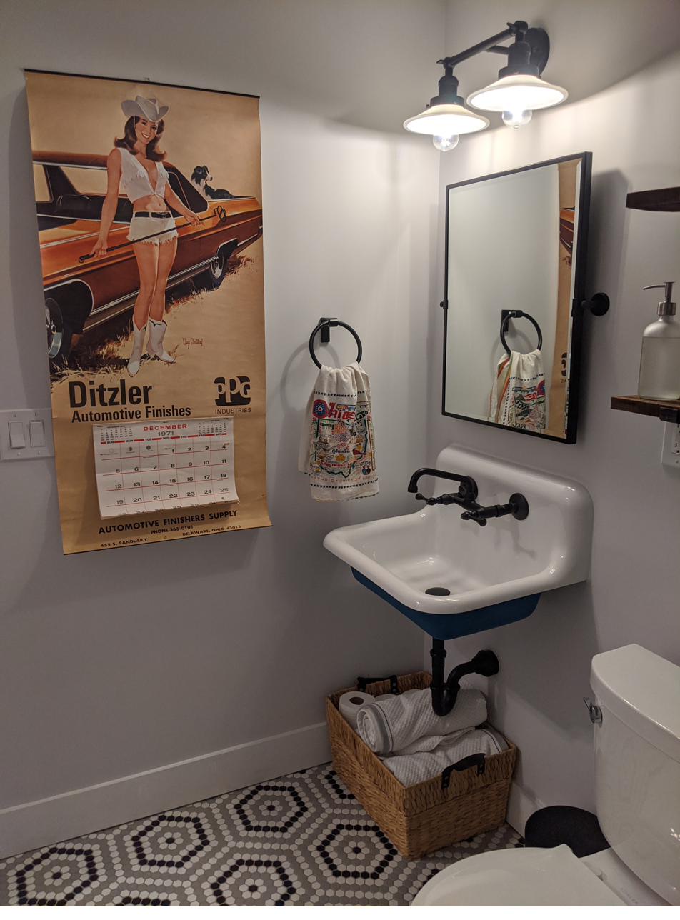 Basement bath, vintage sign & wall-mount sink, view 2 of 2