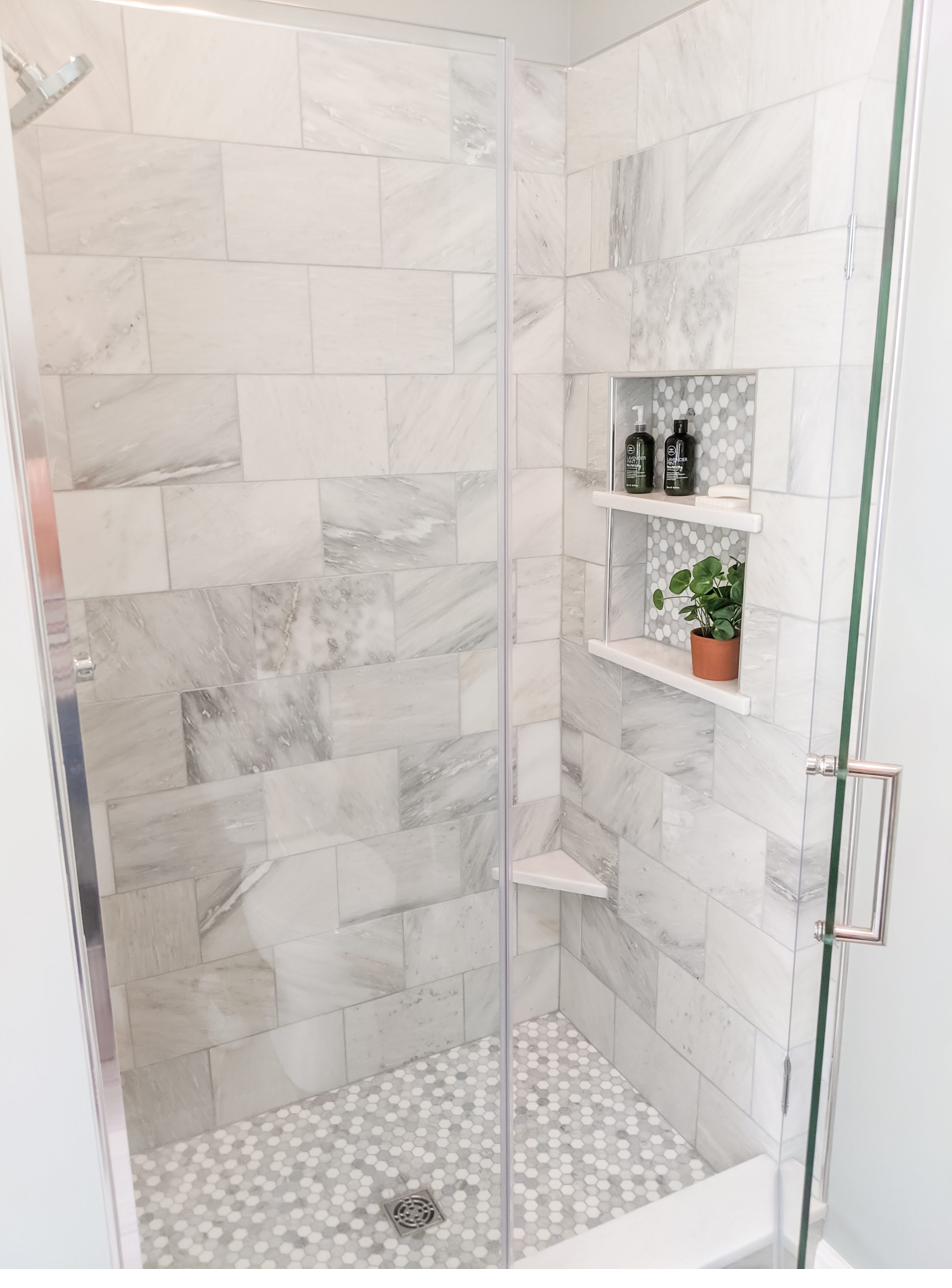 White marble master bath, view 2 of 3