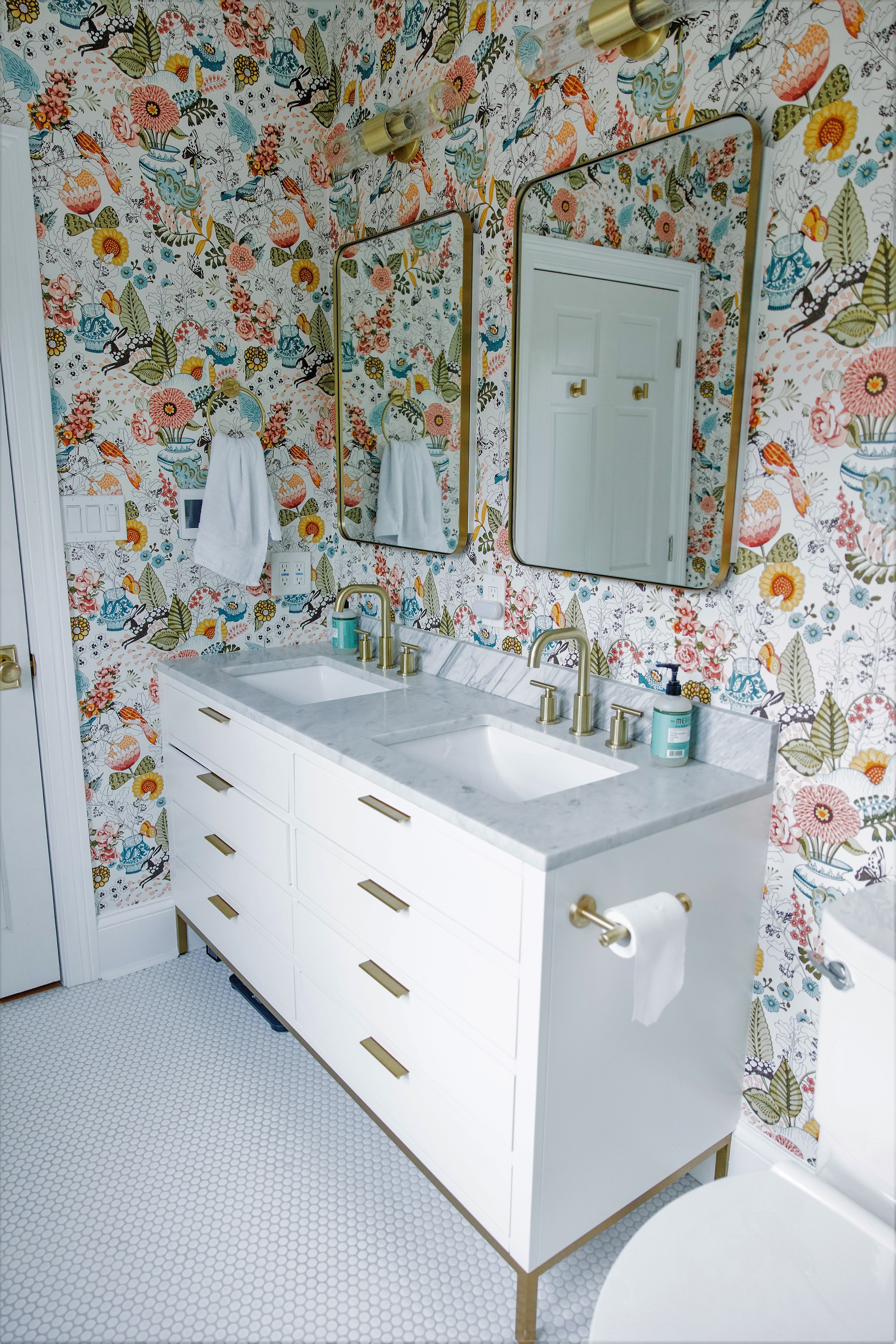 Floral wallpaper bath, white vanity, view 2 of 3