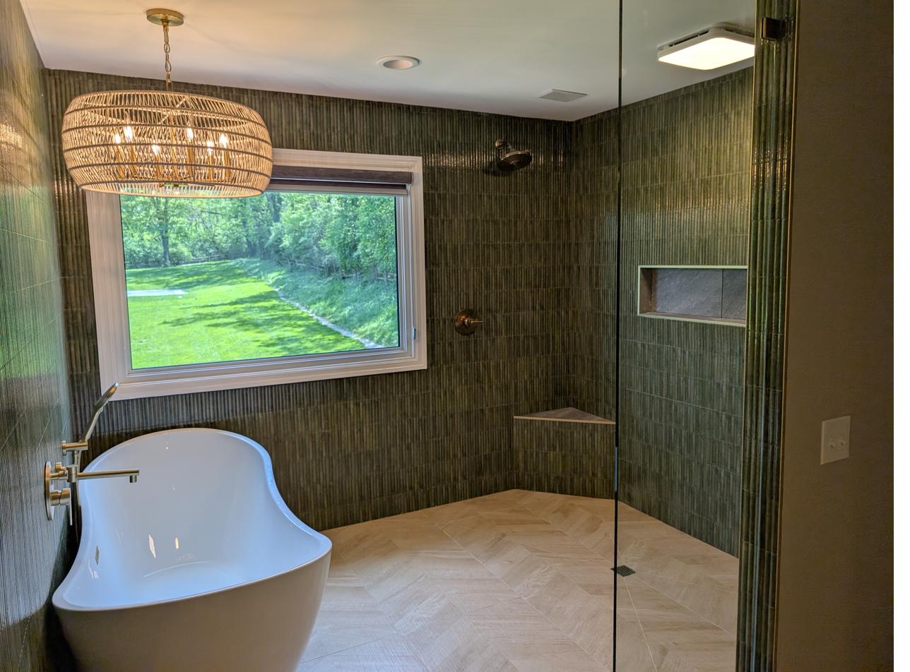Green vertical tile, freestanding tub & wet room, view 1 of 3
