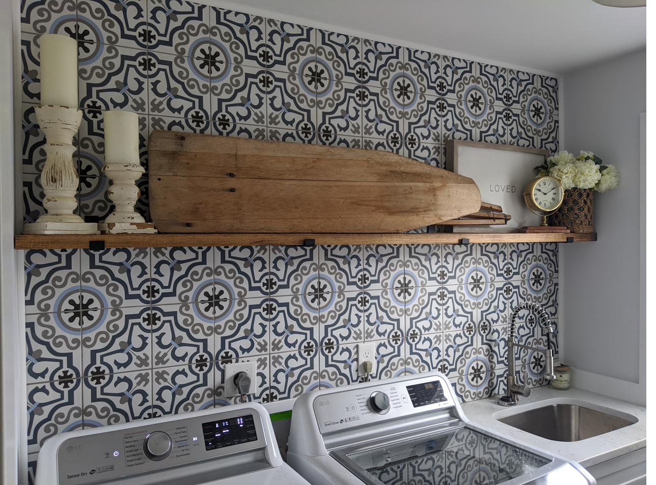 Laundry room, patterned tile wall