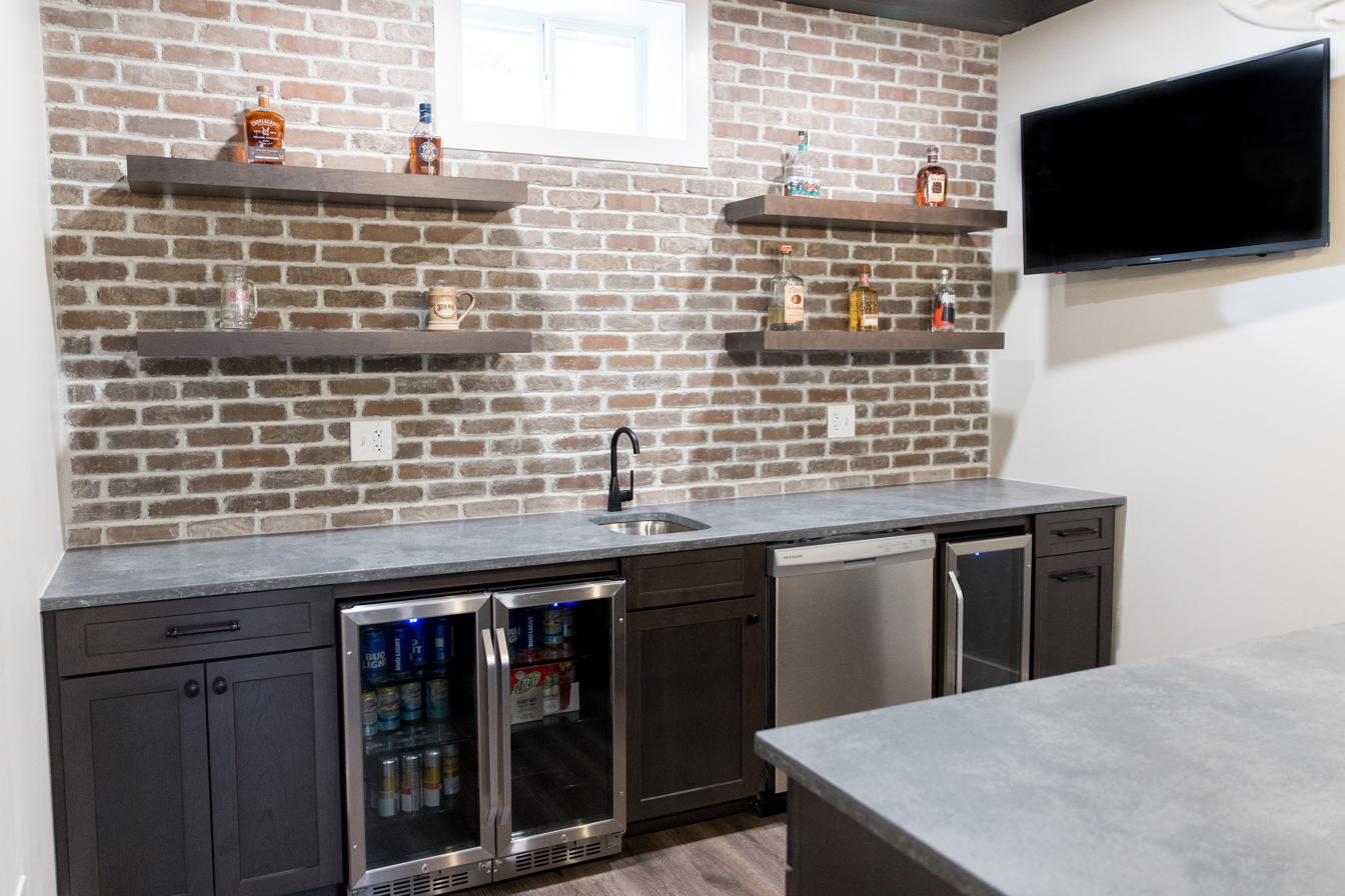 Basement lounge, brick bar & theater wall, view 1 of 7
