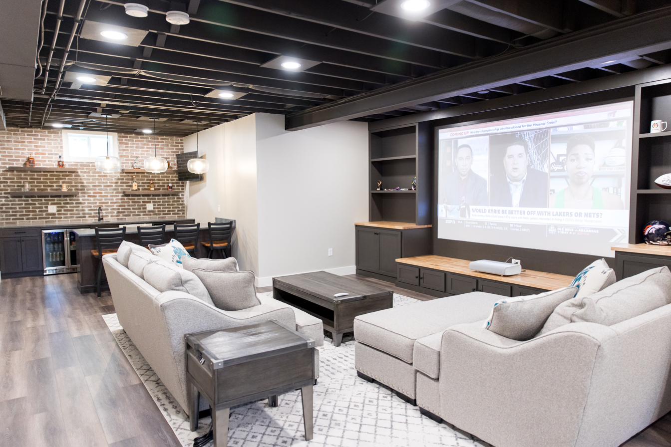 Basement lounge, brick bar & theater wall, view 2 of 7