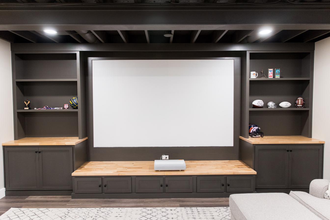 Basement lounge, brick bar & theater wall, view 3 of 7