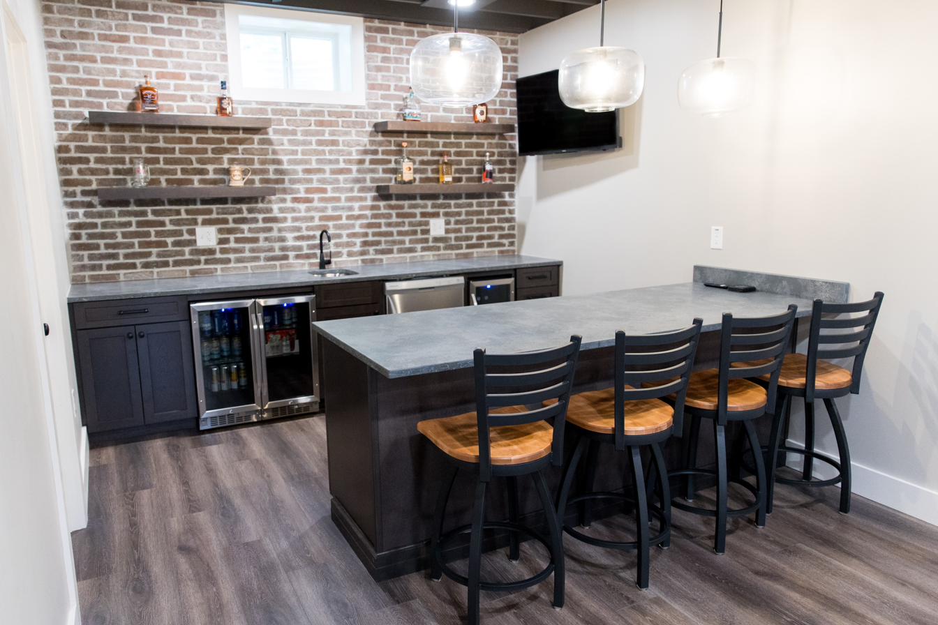 Basement lounge, brick bar & theater wall, view 6 of 7