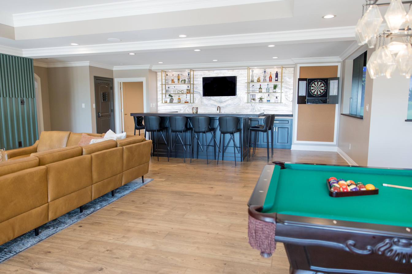 Basement entertainment level: bar, billiards, golf sim, putting green, view 2 of 15