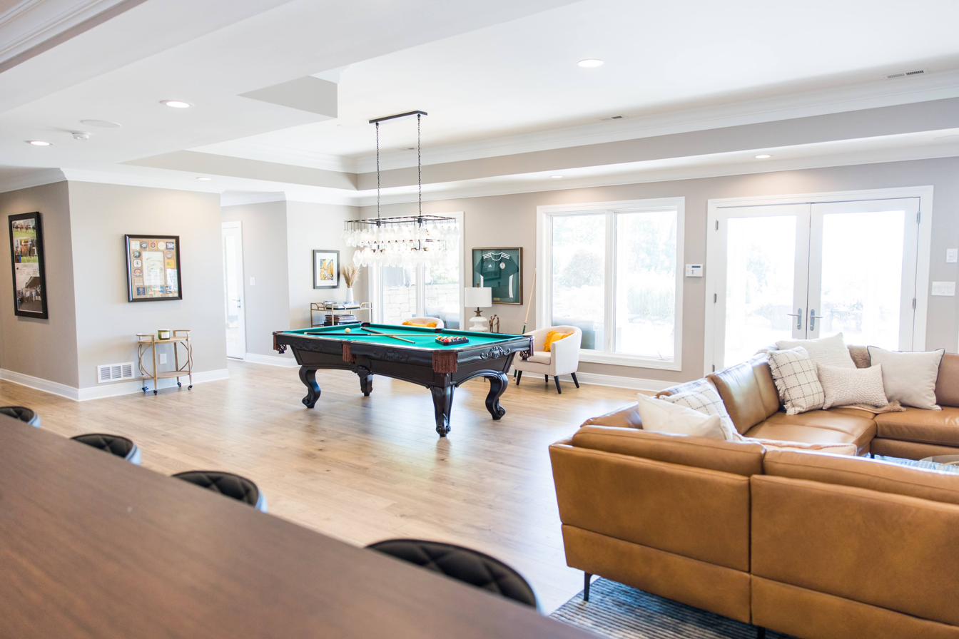 Basement entertainment level: bar, billiards, golf sim, putting green, view 8 of 15