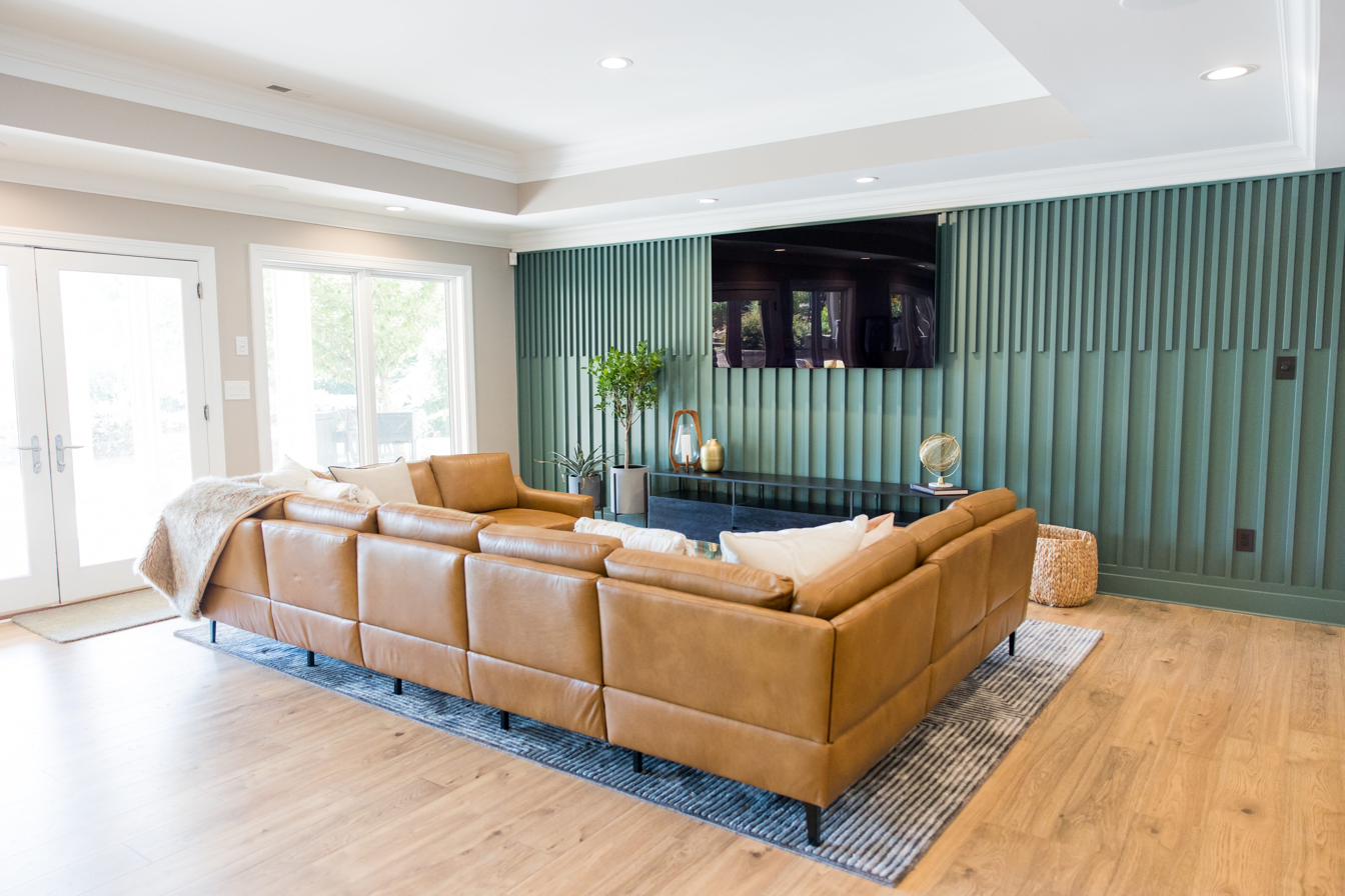 Basement entertainment level: bar, billiards, golf sim, putting green, view 9 of 15