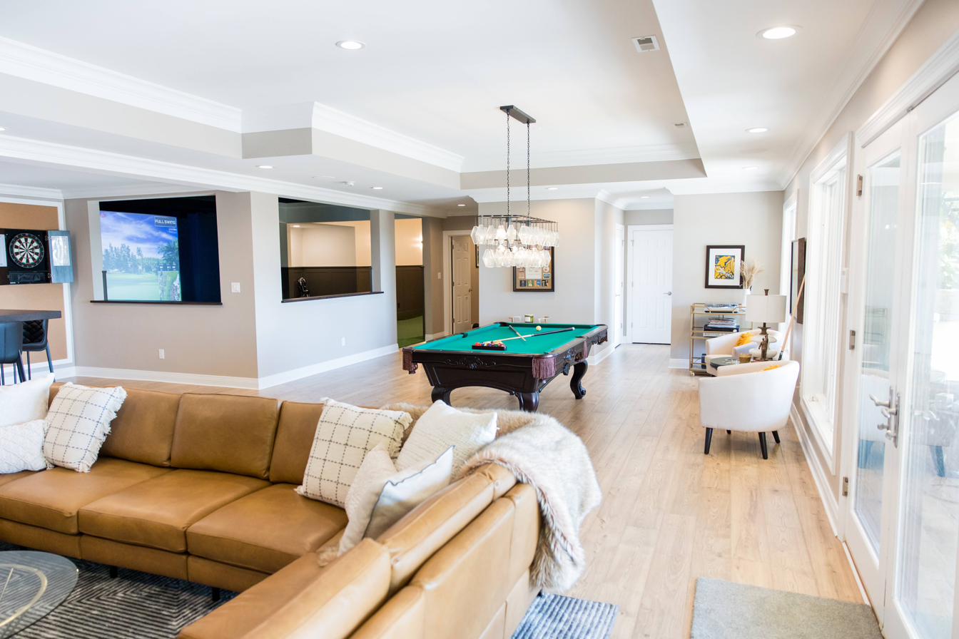 Basement entertainment level: bar, billiards, golf sim, putting green, view 11 of 15