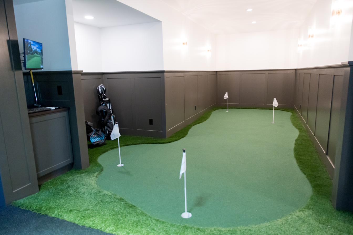 Basement entertainment level: bar, billiards, golf sim, putting green, view 13 of 15