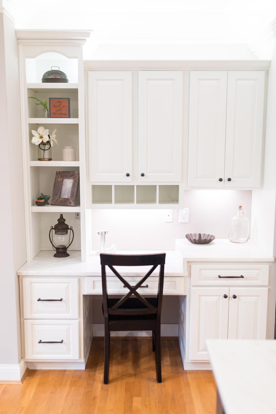White kitchen, charcoal island, view 2 of 9