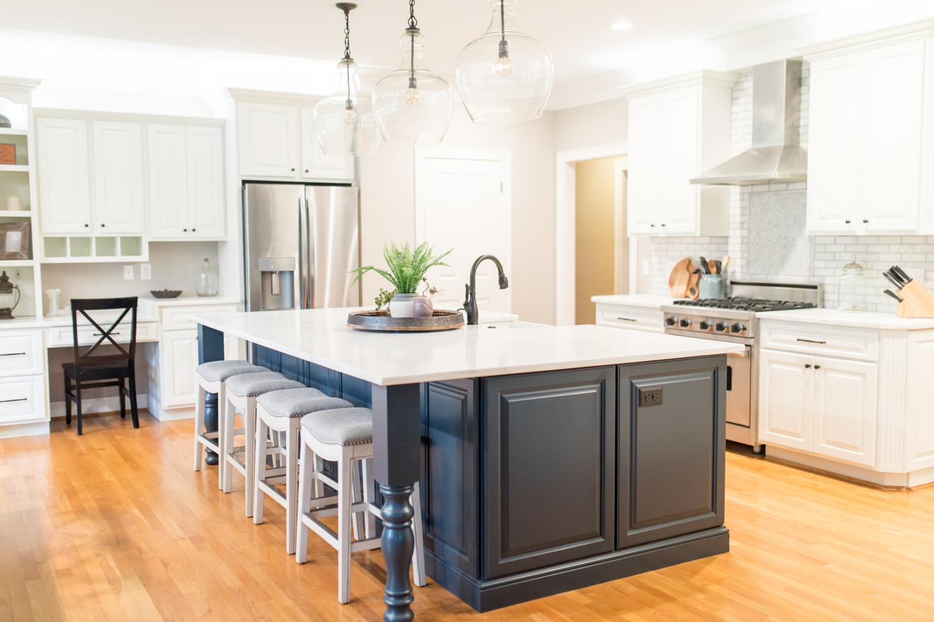 White kitchen, charcoal island, view 3 of 9