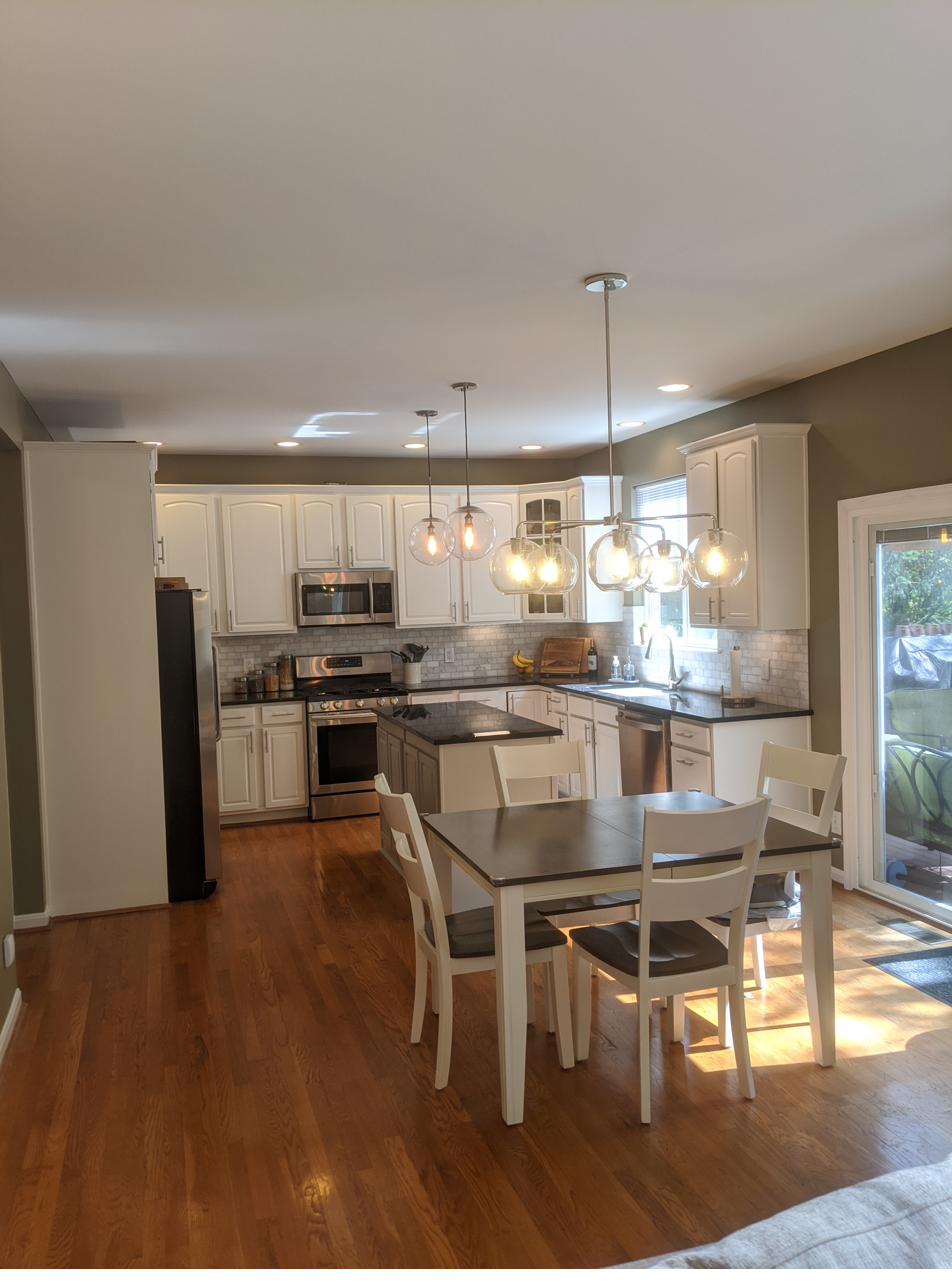 White kitchen with eat-in dining, view 2 of 2