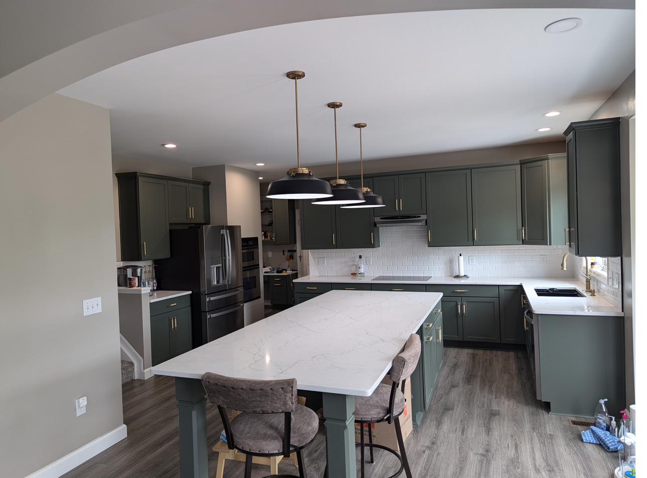 Green cabinets, waterfall island, view 1 of 2
